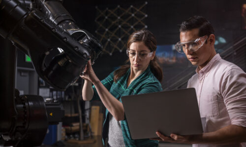 Professional model(s) Working in the robotics lab at the Autodesk San Francisco Technology Center.