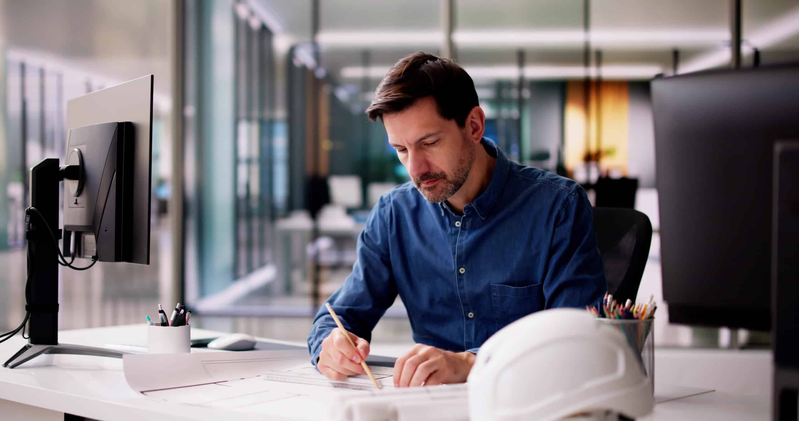 Civil Engineer Drawing Architecture Plan Close-up of a designer working on a complex 3D CAD model using Autodesk software for mechanical engineering and product design