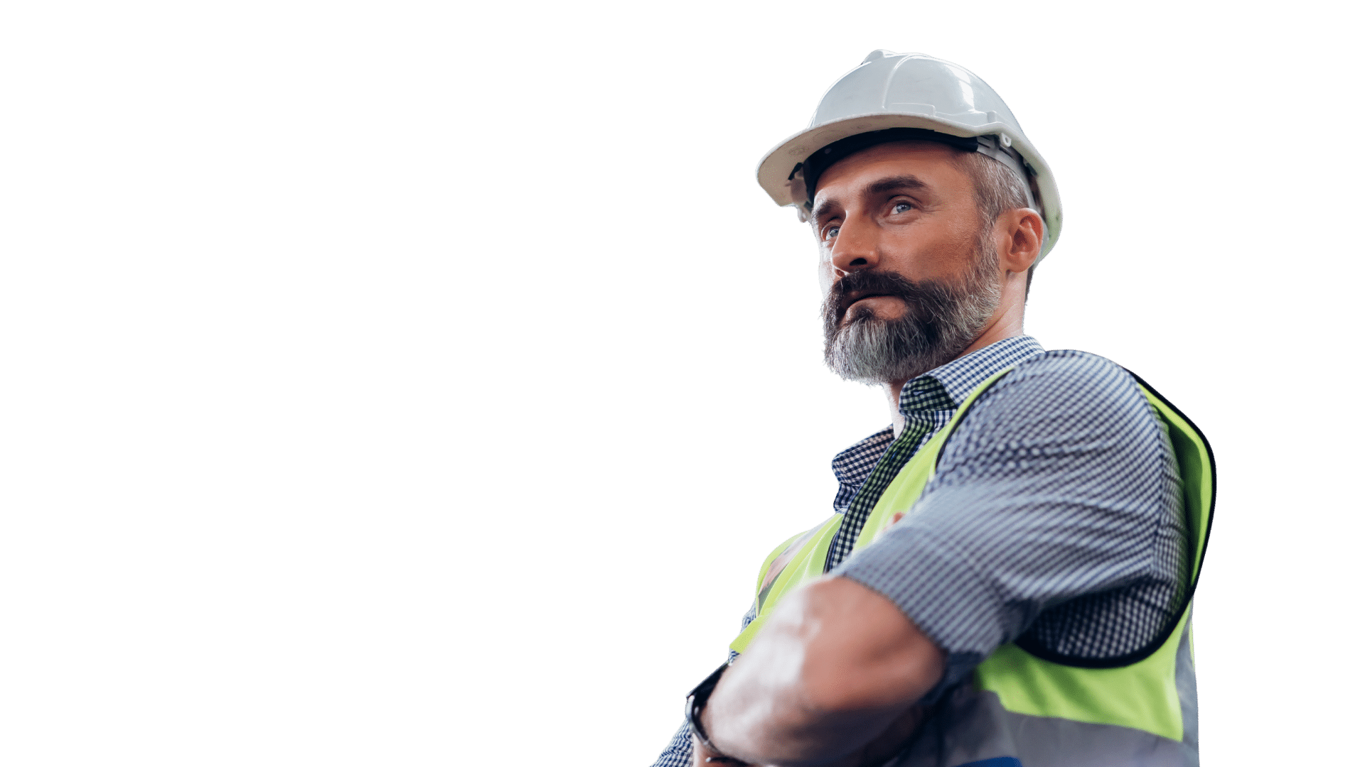 Construction worker wearing hard hat and safety vest with arms crossed on site