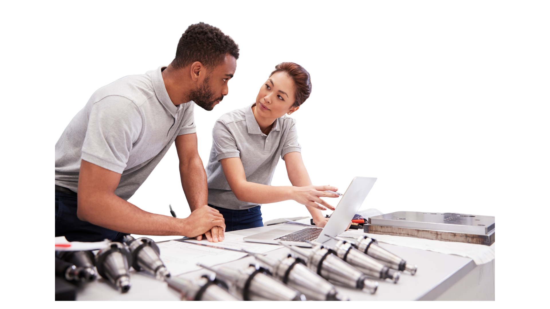 engineering-team-vault-data-management Two engineers collaborating on Autodesk Vault data management implementation in a manufacturing environment